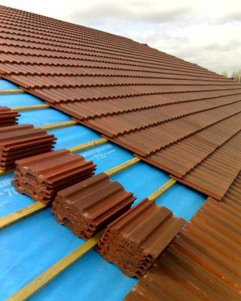 Red clay roofing tiles on roof